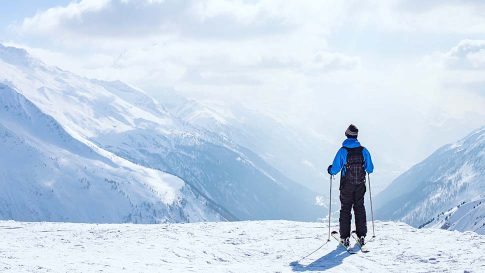 Skiier on mountain